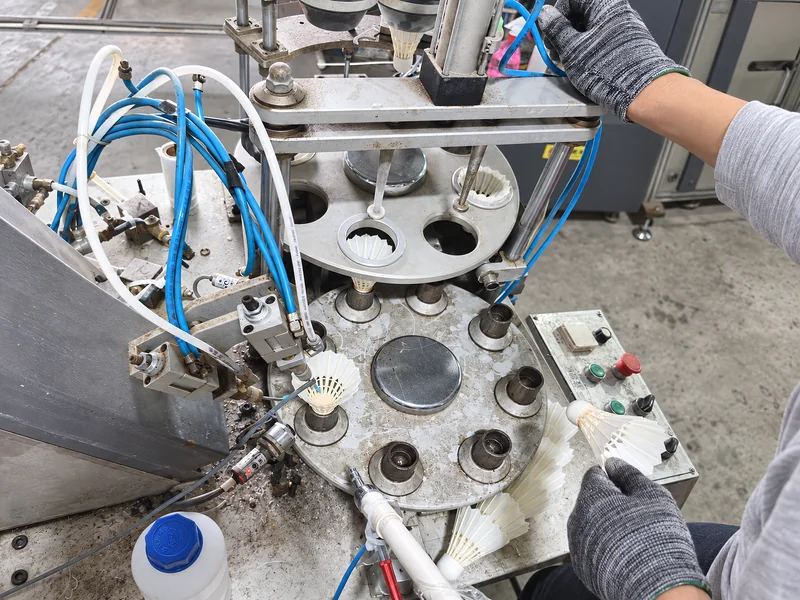 Dual-coil mechanical adhesive rolling and polymer coating station